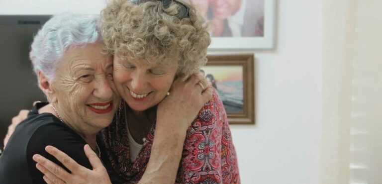 Yudit hugging survivor at Haifa Home for holocaust survivors