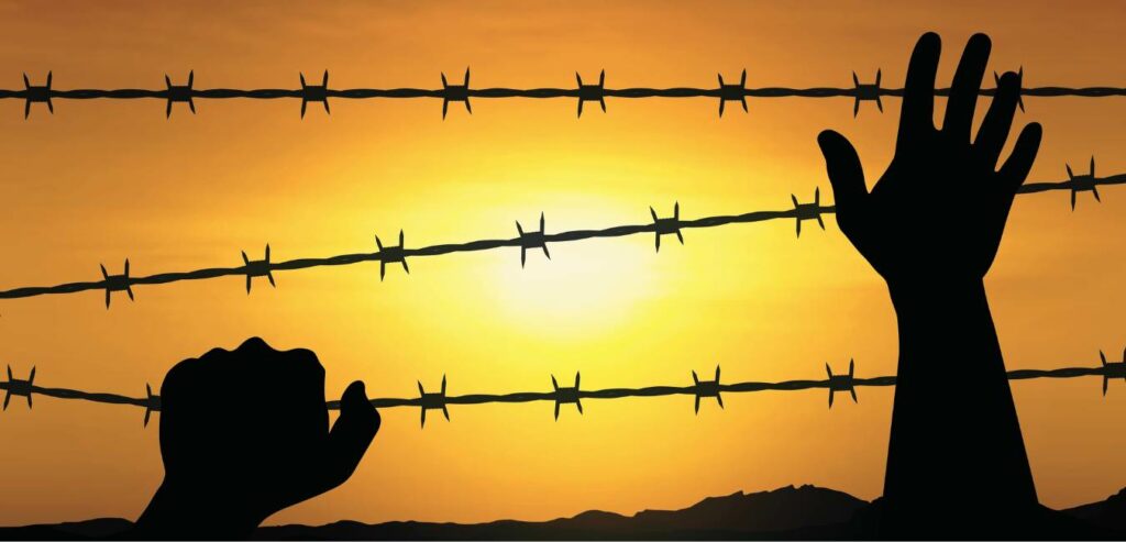 Holocaust Remembrance Day barbed wire and hands