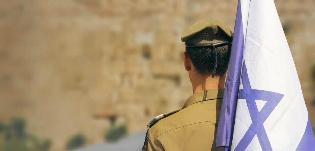 IDF soldier with Israel flag