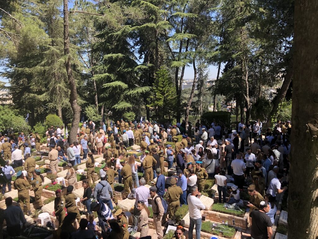 People at military cemetery in Israel for Memorial Day