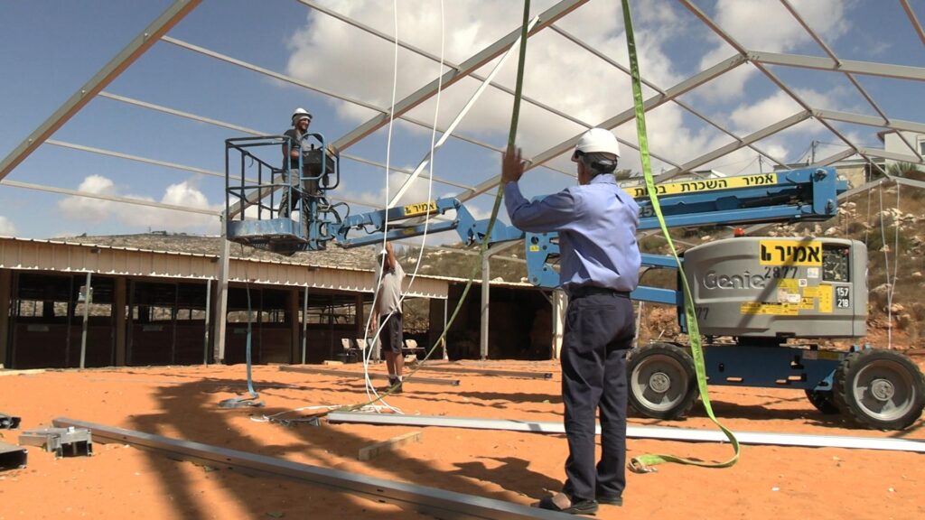 Construction of Shade for riding rink donated by ICEJ in Shiloh