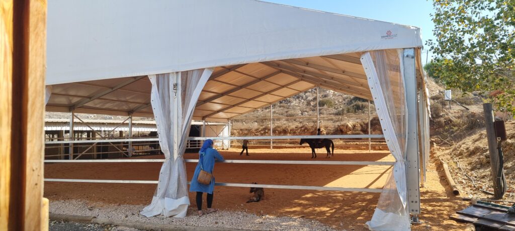 Shade over riding rink in shiloh donated by ICEJ