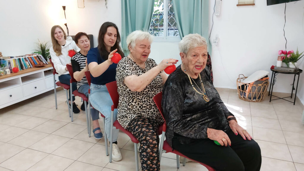 ICEJ staff taking part in a physiotherapy session