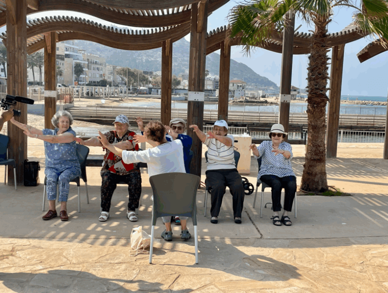 Residents enjoy gymnastics by the sea