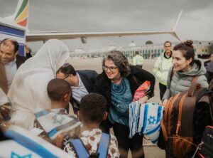 People being greeted after flight