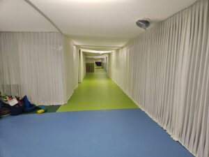 Green and Blue Hallway