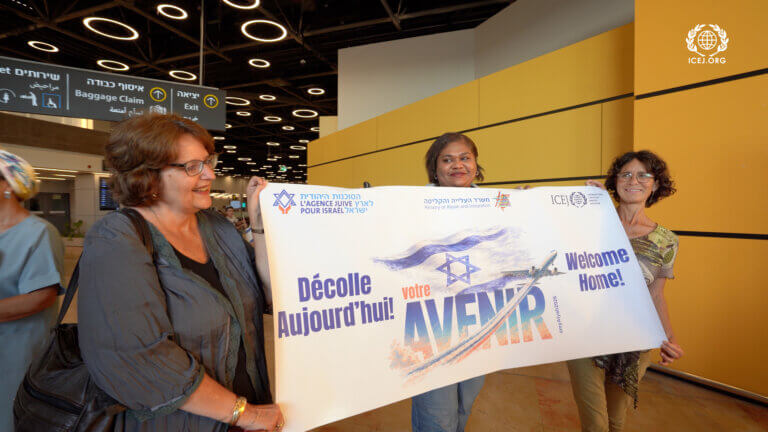 Picture 1 - ICEJ staff welcome the new Jewish immigrants at the Ben Gurion Arrivals hall