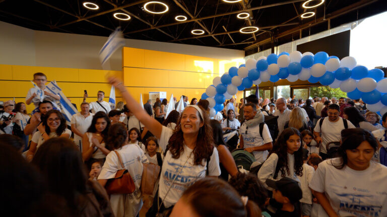 Picture 2 - ICEJ staff welcome the new Jewish immigrants at the Ben Gurion Arrivals hall