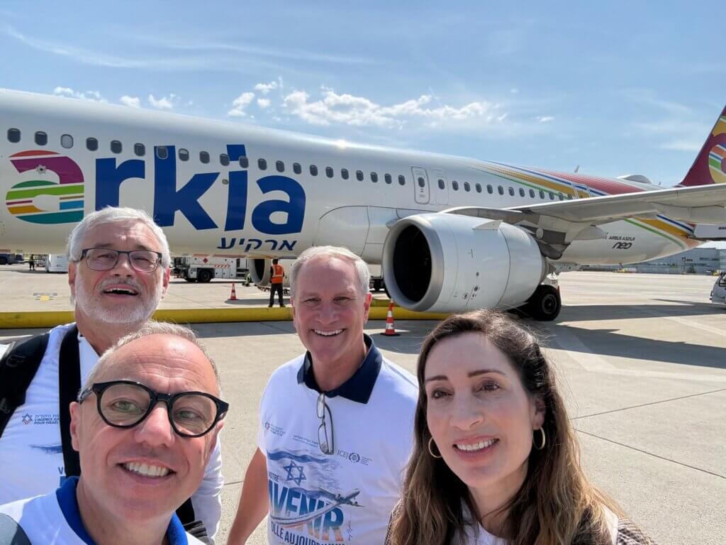 Dominique-Pierre Walter, Robert Baxter, Philippe Gablin (ICEJ) and Danielle Mor (JAFI) ready to board the Aliyah flight