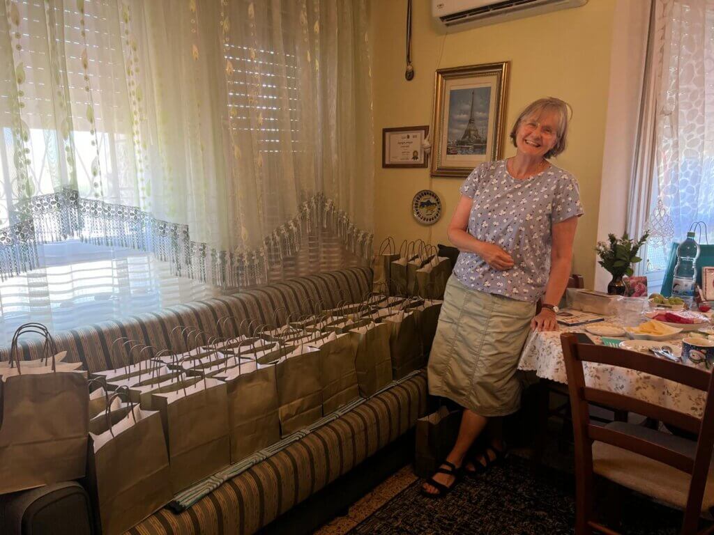 Corrie with Rosh HaShanah gifts ready for delivery.