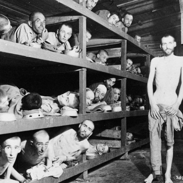 These are slave laborers in the Buchenwald concentration camp near Jena, East Germany.  Many had died from malnutrition when U.S. troops of the 80th Division entered the camp April 16, 1945. Man at far right of center bunk is Elie Wiesel. (AP Photo)