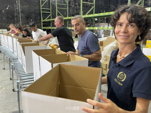 ICEJ packing boxes for needy Israel War 2023 Simchat torah attacks Aid